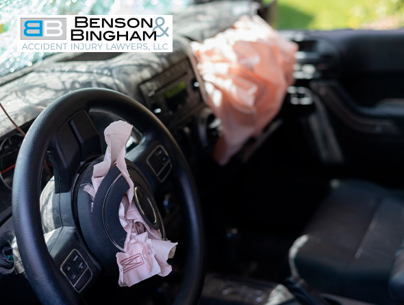Interior of a car showing deployed airbags, indicative of a case for a Las Vegas car accident attorney.