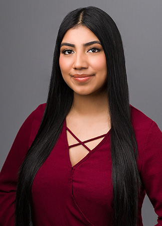 Andrea Garcia, Receptionist