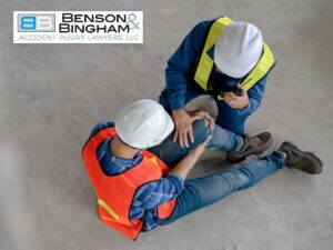 Injured worker receiving help on site – Workers' Compensation support