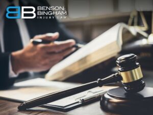 Las Vegas-based personal injury attorney reviewing legal case with gavel