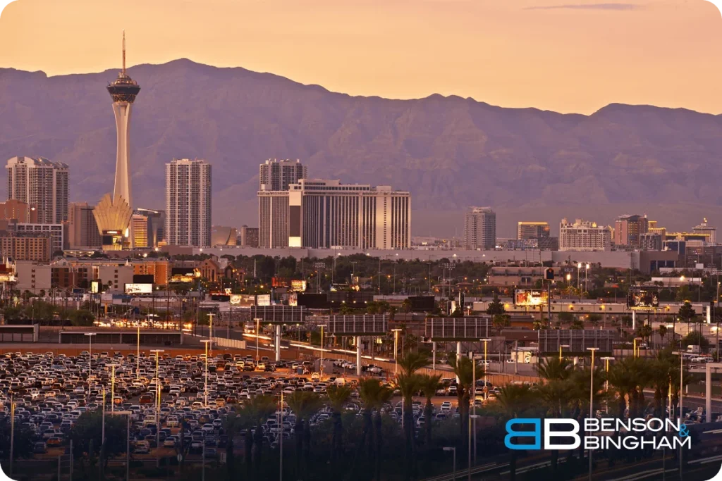 Las Vegas skyline at dusk with mountains behind the city